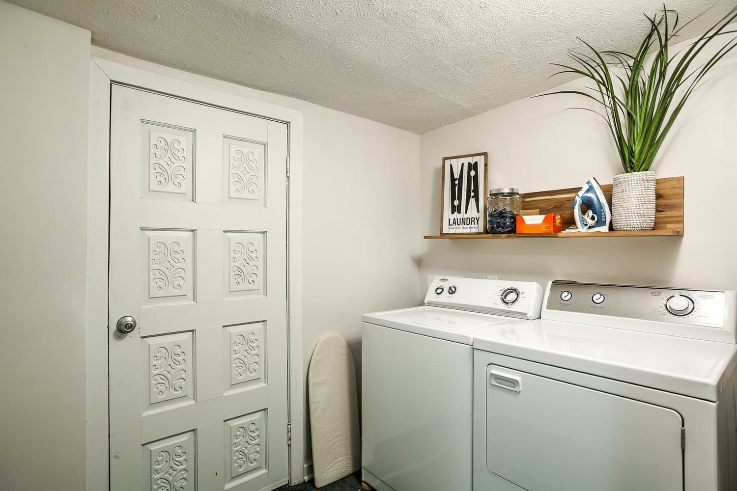 Laundry Room staged by Acorn Home Staging — Vacation Rental Design