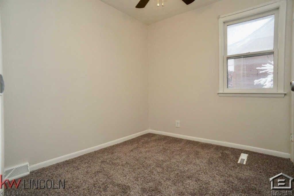 Bedroom before staging — Vacation Rental Design