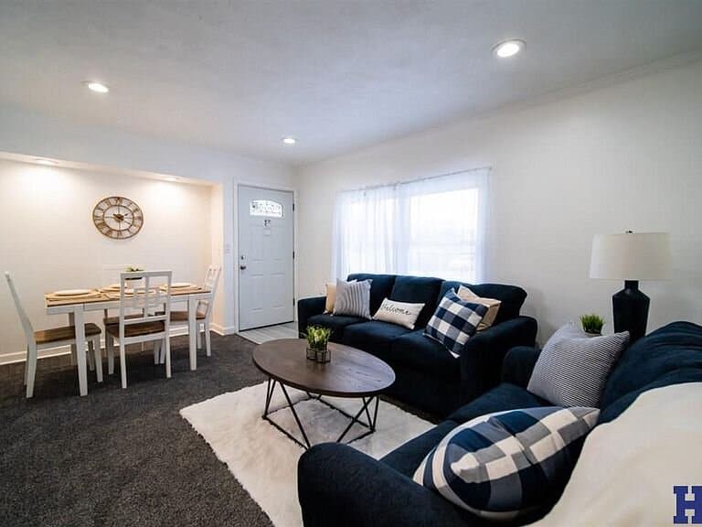 Staged living room showing furniture placement