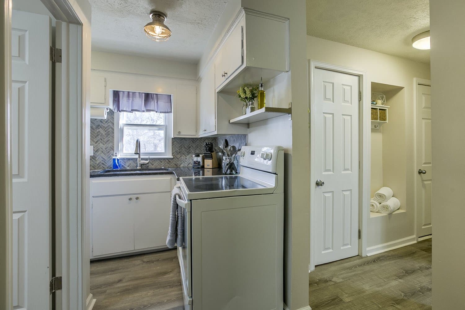 Kitchen staged by Acorn Home Staging — Vacation Rental Design